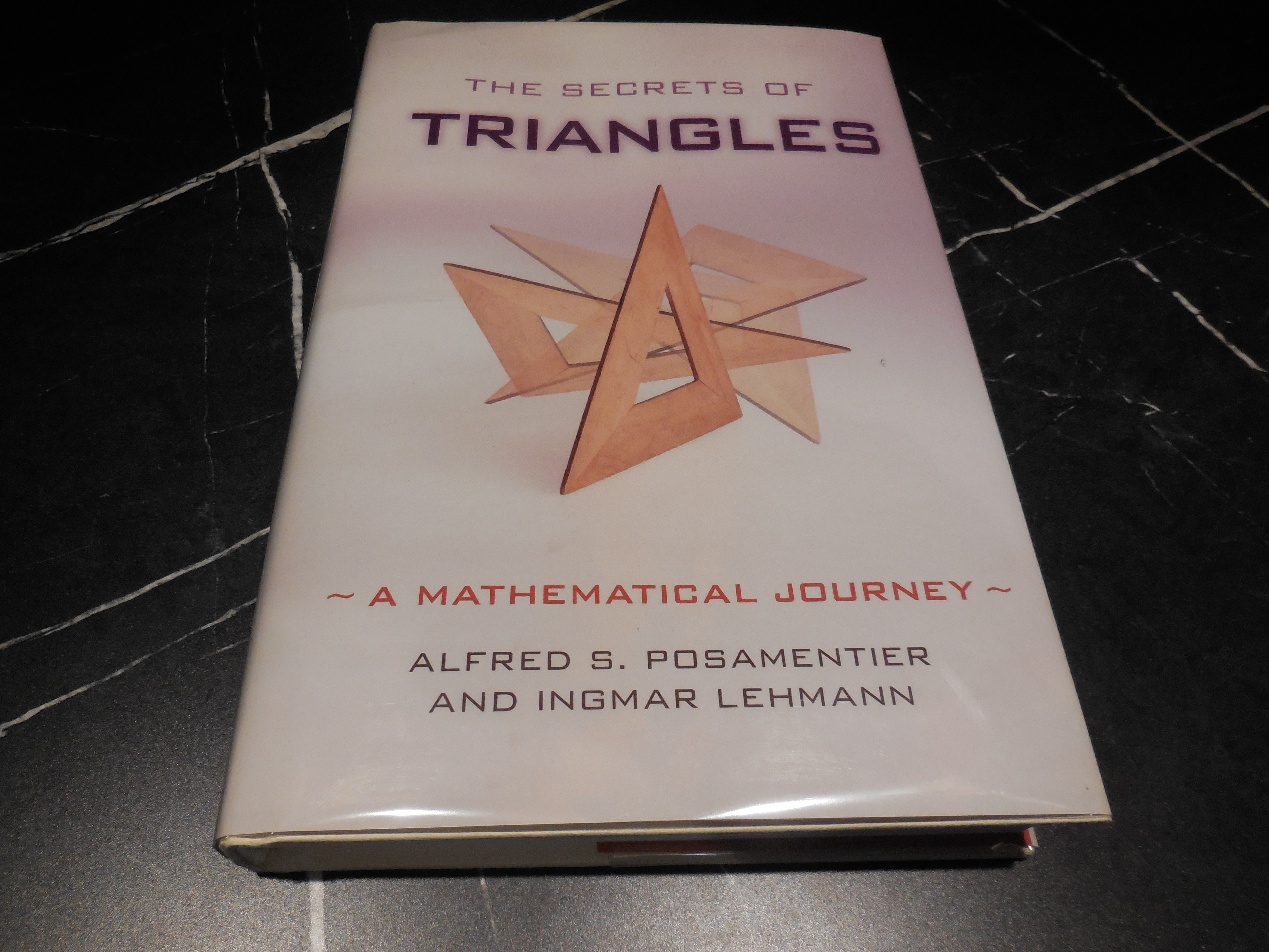 The Secrets of Triangles: A Mathematical Journey