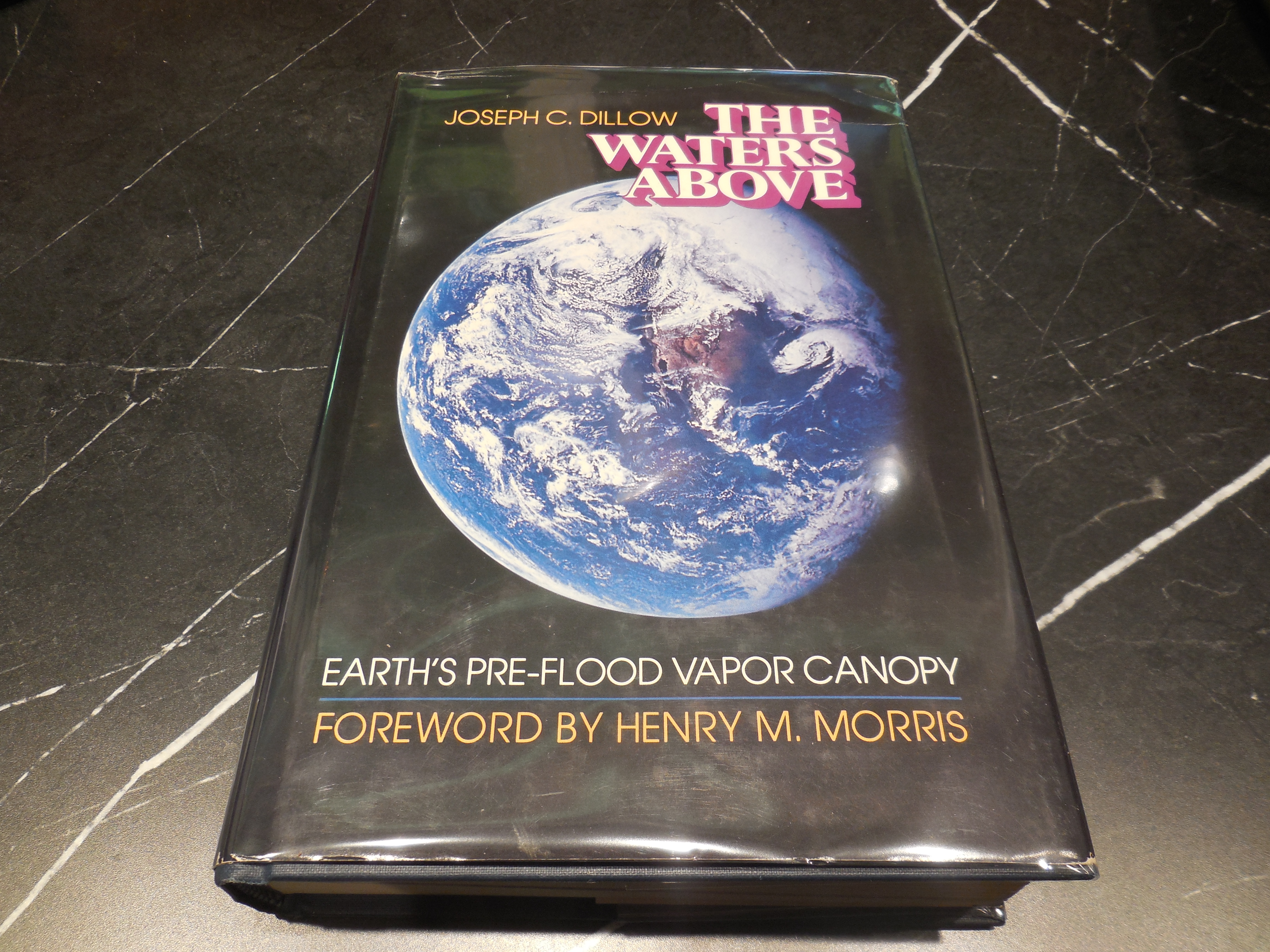 The Waters Above: Earth's Pre-Flood Vapor Canopy