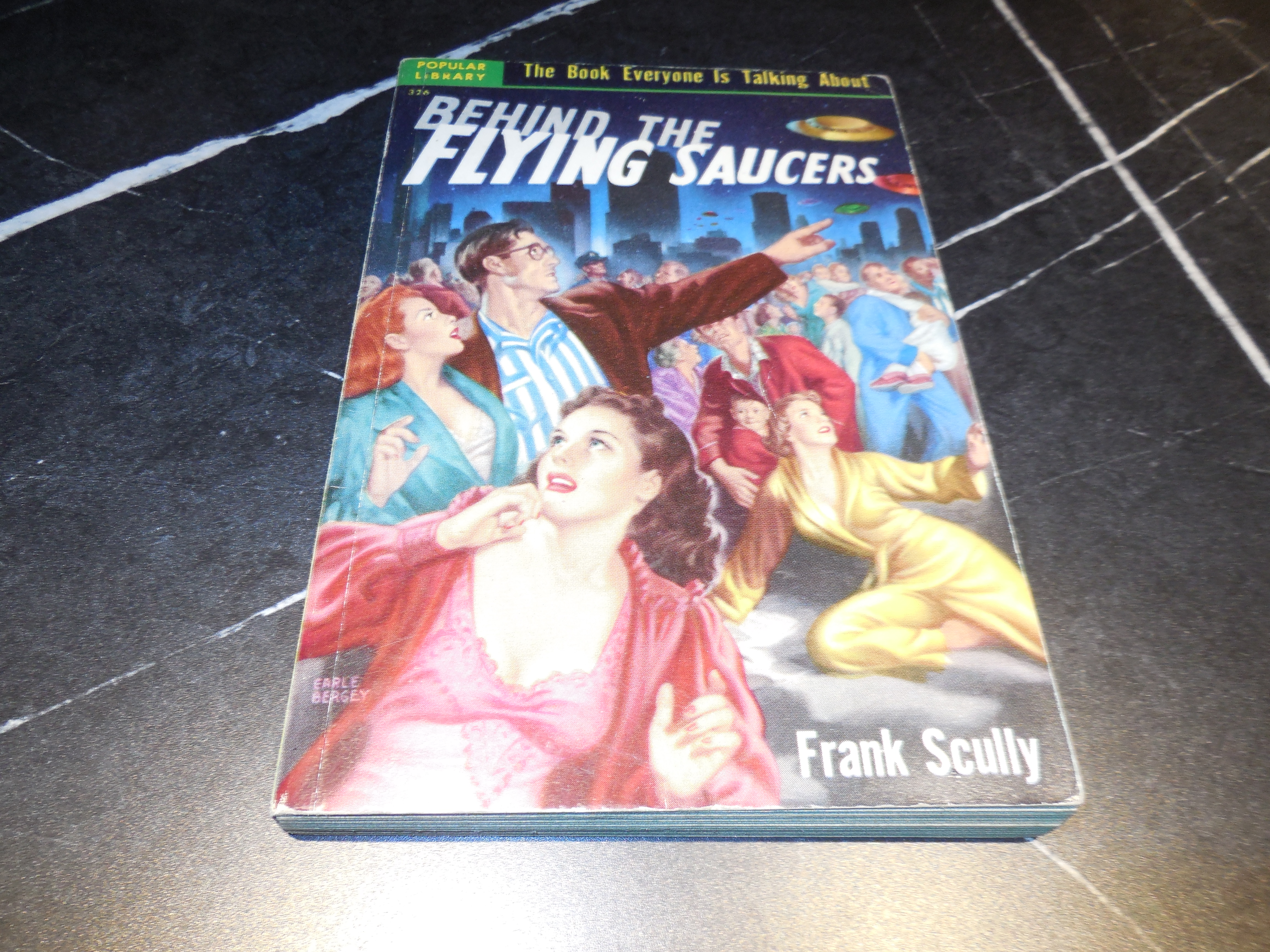 Behind the Flying Saucers